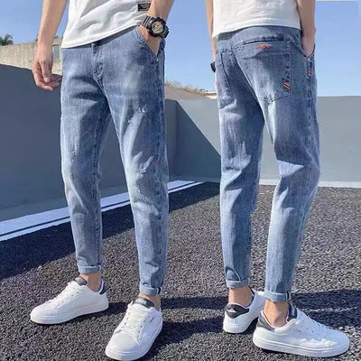 Korea vabaaja püksid Meeste pahkluuni ulatuvad teksad Kvaliteetsed suvised venivad puuvillased augud õhukesed tänavarõivad disain teksapüksid