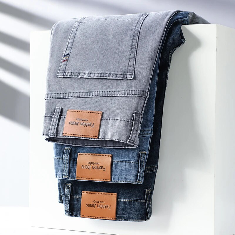 2023 m. prekės ženklo plonos arba storos medžiagos tiesios medvilnės tamprus džinsas vyriški laisvalaikio verslo klasės džinsai su aukštu juosmeniu šviesiai pilki mėlyni džinsai