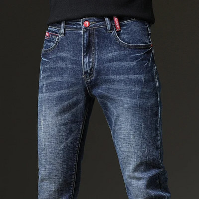 Ανοιξιάτικο φθινόπωρο 2023 Ανδρικά μπλε τζιν μονόχρωμα μικροελαστικά κλασικά τζιν ανδρικά ίσια λεπτή μόδα Αντρικό τζιν παντελόνι