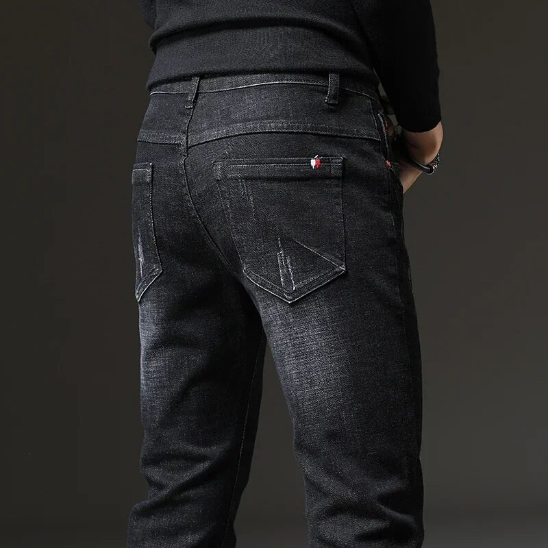 Ανοιξιάτικο φθινόπωρο 2023 Ανδρικά μπλε τζιν μονόχρωμα μικροελαστικά κλασικά τζιν ανδρικά ίσια λεπτή μόδα Αντρικό τζιν παντελόνι