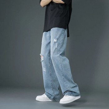 Пролет и лято Новият стил е тънки скъсани дънки Корейска улична мода Свободни дънкови панталони Широки сини ежедневни панталони
