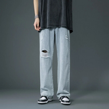 Пролет и лято Новият стил е тънки скъсани дънки Корейска улична мода Свободни дънкови панталони Широки сини ежедневни панталони