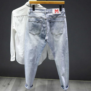 Ανδρικά τζιν κορεατικής μόδας σπασμένα με στάμπα με λεπτή στάμπα σκισμένο παντελόνι καουμπόη ρετρό γραφικό παντελόνι με τρύπες κλασικό