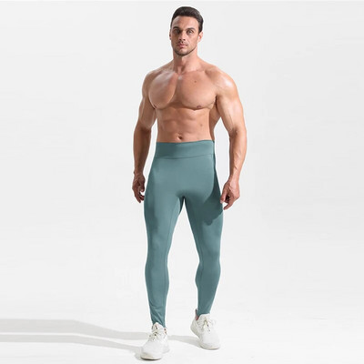Kompressioonsäärised Spordisukkpüksid Tasku kõrge vöökohaga Fitnesspüksid Meeste roosad hingavad elastsed alasti tundlikud õmblusteta püksid
