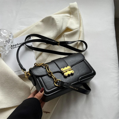 Naiste käekott 2023 uusima trendiga naiste ristkehaga kott Disainer soliidne kett Vintage Elegance Nahast luksusliku disainiga naiste rahakotid