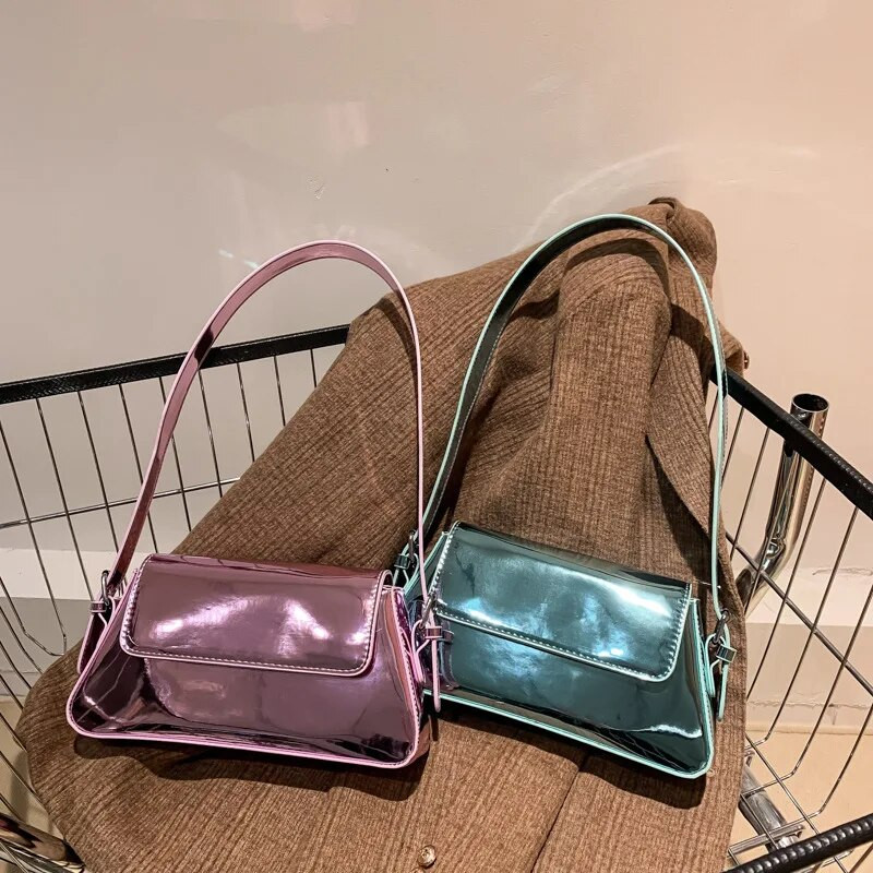 Γυναικείες τσάντες μασχάλης λέιζερ επώνυμων σχεδιαστών πολυτελείας 2023 Ασημένιες κομψές γυναικείες τσάντες ώμου Συμπλέκτες για πάρτι Trend γυναικεία πορτοφόλια και τσάντες