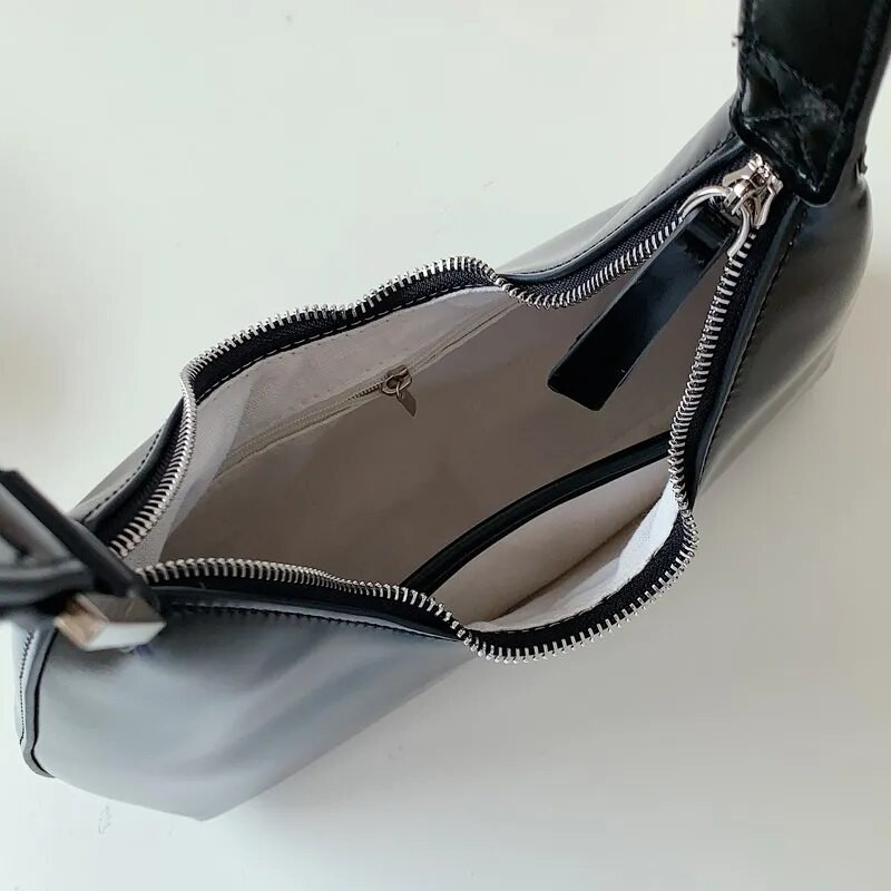 Sieviešu soma 2023 Zīmols Dizainera rāvējslēdzējs Mazas rokassomas Sieviešu modes plecu soma PU ādas gadījuma somas