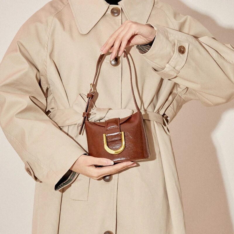 2023 New Bucket Classic Augstas kvalitātes mazas rokassomas Luksusa Dizains Vasaras gadījuma daudzpusīga Crossbody Bag Mode Ādas Pleci