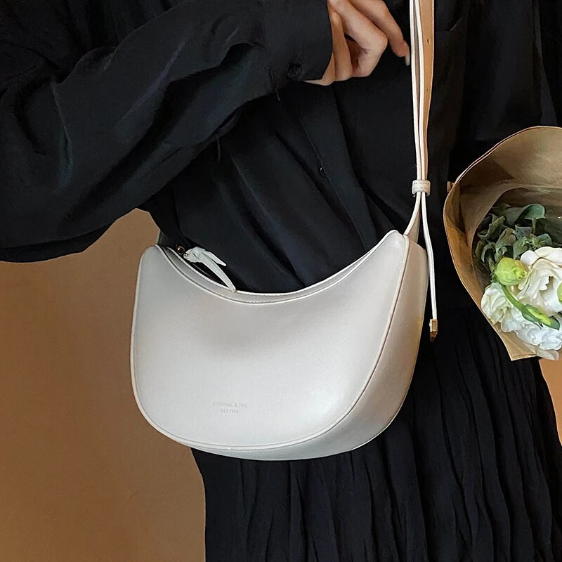 Vasaros universalus 2023 m. paprasto stiliaus kryžminio stiliaus krepšiai moterims Nauji prabangūs dizainerių kasdieniai pečių krepšiai Klasikinė madinga solidi piniginė