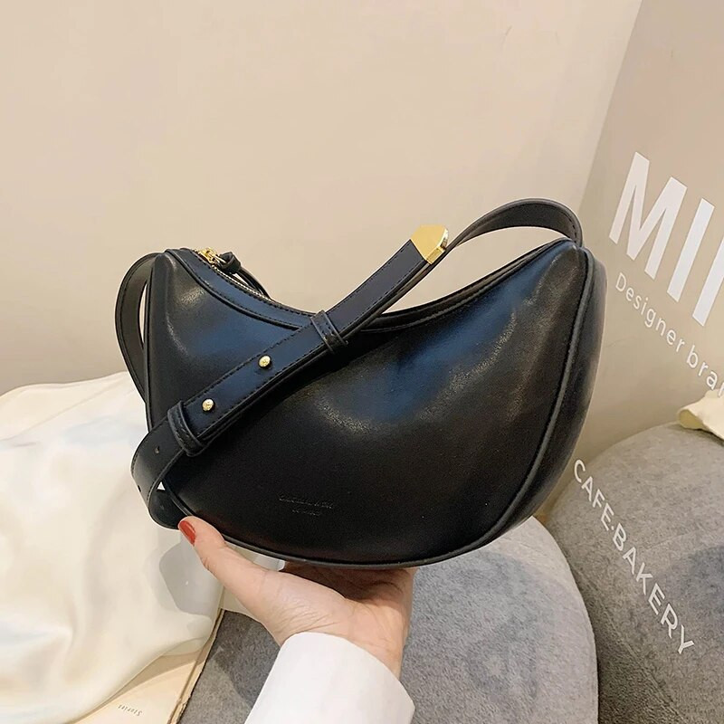 Vasaros universalus 2023 m. paprasto stiliaus kryžminio stiliaus krepšiai moterims Nauji prabangūs dizainerių kasdieniai pečių krepšiai Klasikinė madinga solidi piniginė