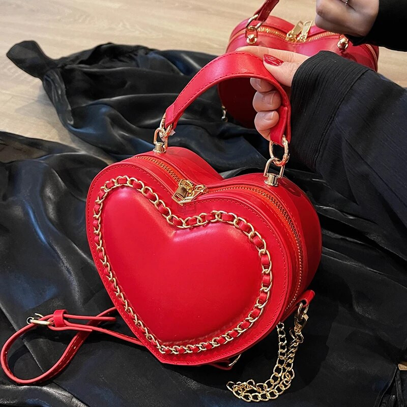 Prabangios dizainerio naujos meilės grandinėlės kryžminio kūno krepšiai moterims, mielos vasaros laisvalaikio ant pečių 2023 m. klasikinės madingos moteriškos PU odinės piniginės