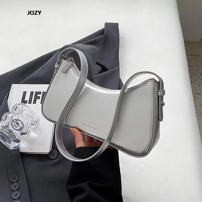 2023. Nove luksuzne torbe na rame jednostavnog stila za žene Ljetne modne svestrane kožne male torbice Klasične čvrste ručne torbice