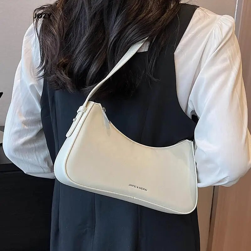 2023. Nove luksuzne torbe na rame jednostavnog stila za žene Ljetne modne svestrane kožne male torbice Klasične čvrste ručne torbice
