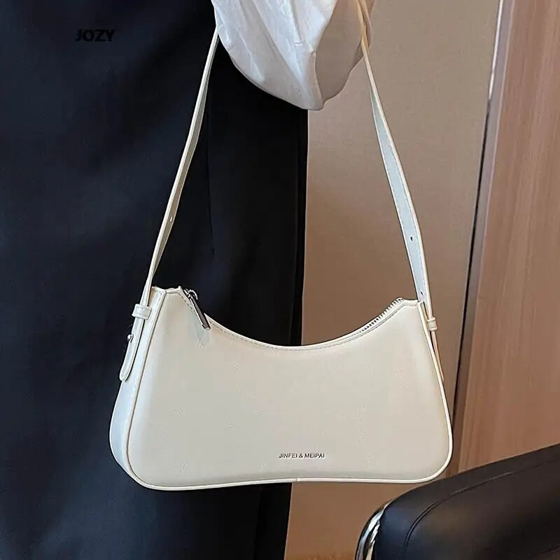 2023. Nove luksuzne torbe na rame jednostavnog stila za žene Ljetne modne svestrane kožne male torbice Klasične čvrste ručne torbice