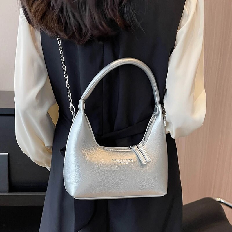 Daugiaspalvės paprasto stiliaus pusmėnulio rankinės Prabangios dizainerio naujos kasdienės grandinėlės kryžminio kūno krepšys 2023 m. mados vasaros petys moterims