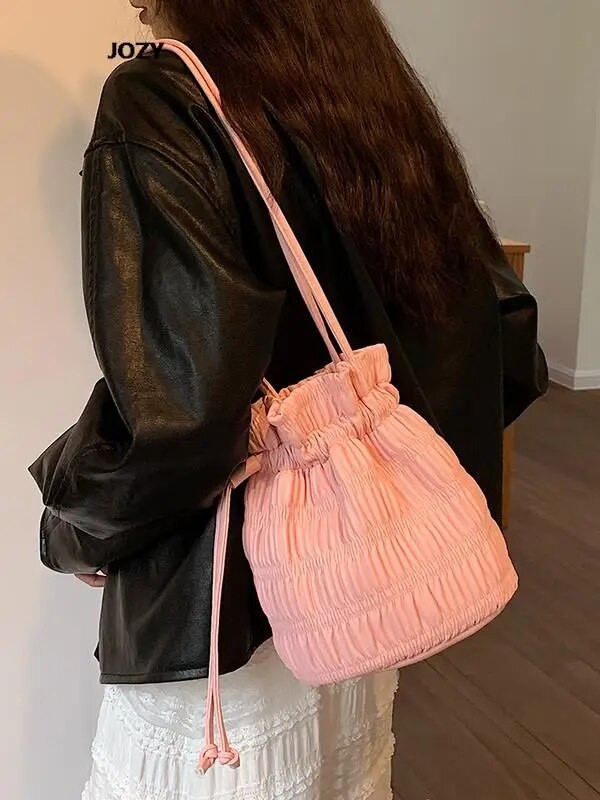 Bucket torbe preko ramena Ležerne ljetne luksuzne dizajnerske jednobojne za žene Jednostavan stil Male torbe na rame 2023. Trendovska svestrana torbica