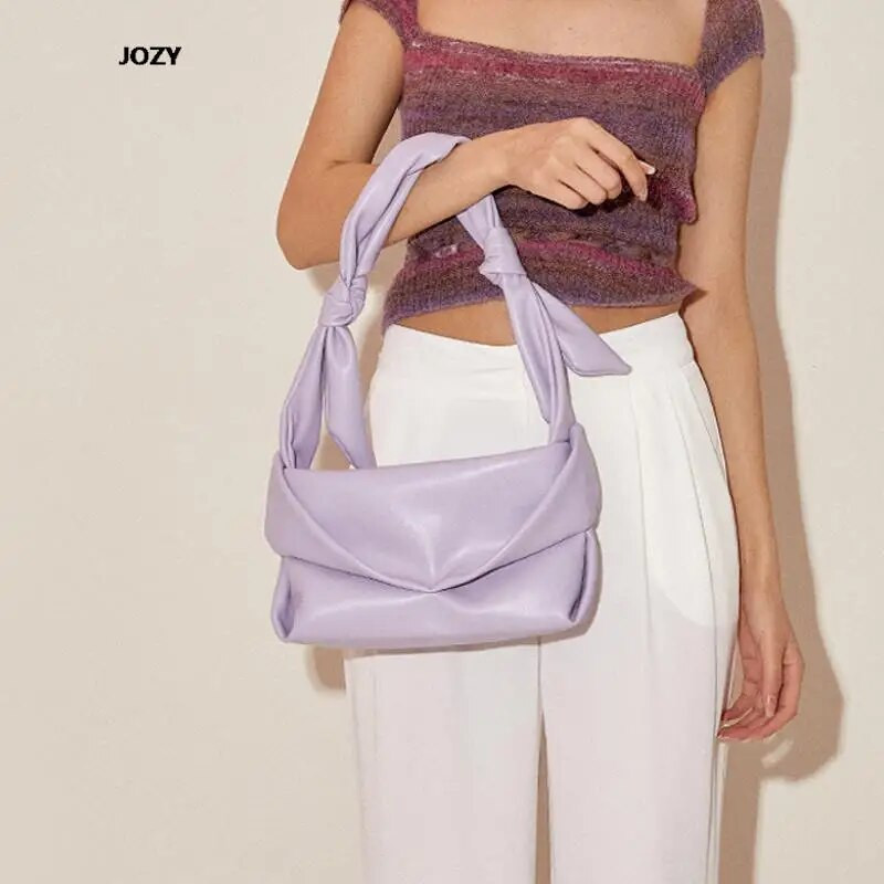 Armas moodne mitmekülgne õlakott naistele Luksusliku disainiga suvised vabaaja käekotid Trendikas lihtsas stiilis ühevärvilised naiste rahakotid