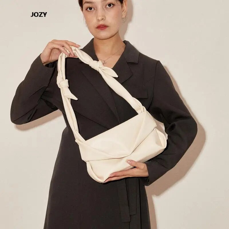 Armas moodne mitmekülgne õlakott naistele Luksusliku disainiga suvised vabaaja käekotid Trendikas lihtsas stiilis ühevärvilised naiste rahakotid