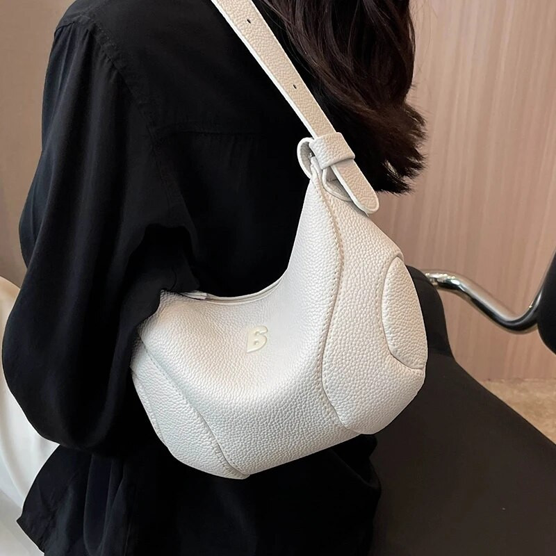 Luksuzna dizajnerska mala modna torba na rame za žene Ljetne ležerne modne torbice Novi jednostavni stil kožne polumjesečeve torbe preko ramena