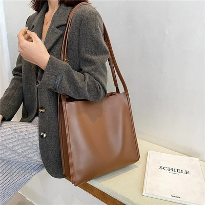 Jauna dizainera augstas kvalitātes sieviešu plecu soma Ādas rokassomiņa Lielas ietilpības vienkrāsainas sieviešu somas pircēju kurjera soma