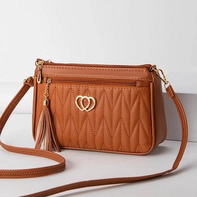 PU Crossbody kotid Topelttõmblukuga 2023 Uus moodne õlakott naistele, suure mahutavusega tutikaunistusega südamekujuline riistvara