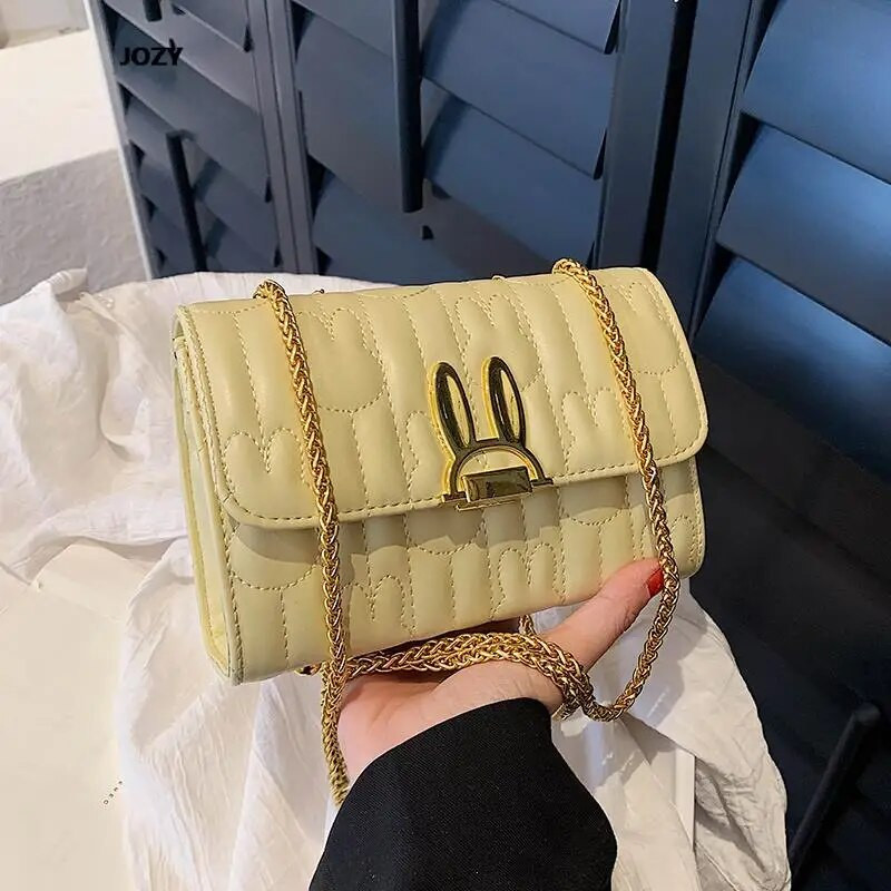 Armsad klassikalise moeketiga ristkehaga kotid naistele, luksusliku disainiga, uued 2023. aasta õlgsuvised vabaaja lihtsad PU-nahast käekotid