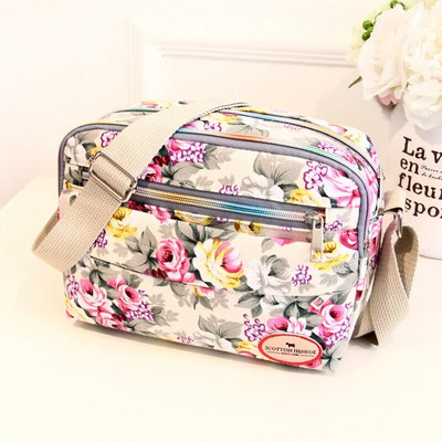 Moodne lilleline mitmevärviline prinditud lõuend Naiste käekott Trend õlakott Nailonist vabaaja sõnumikott Vanema kingitus