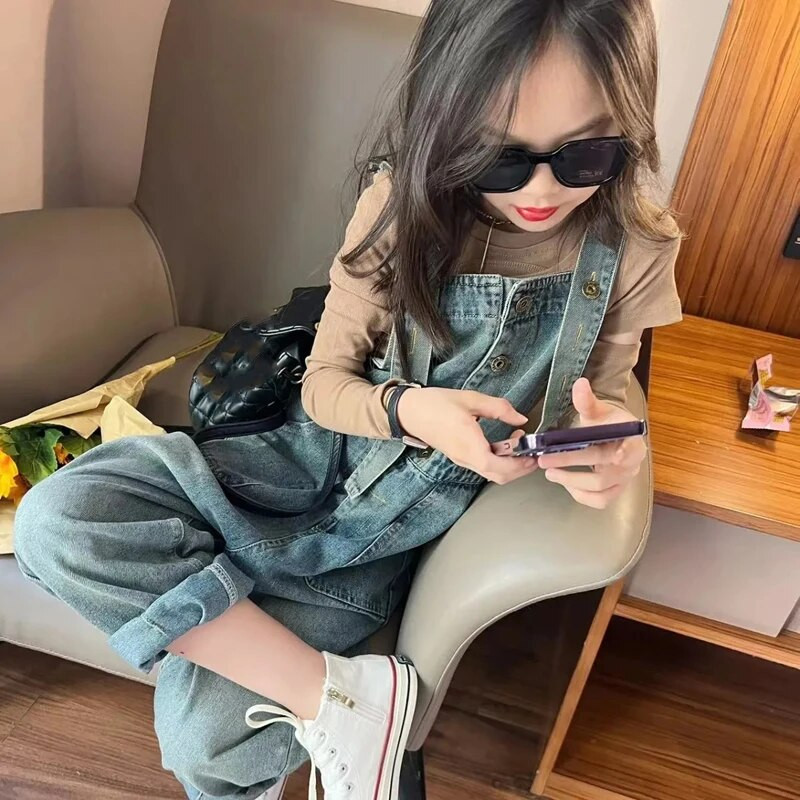 Fashion Trend Mergaičių džinsiniai kombinezonai pavasario rudeniniai laisvalaikio vaikiški džinsai aukštu juosmeniu kelnaitės kūdikių šliaužtinukai Džinsiniai kombinezonai