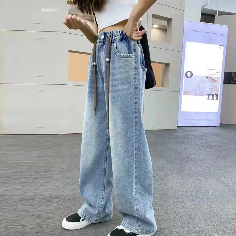 Korėjietiška versija mergaičių aukštu juosmeniu elastinės džinsinės kelnės Pavasaris Ruduo Nauji Vaikiški Džinsai Mergaitei Vintažinės laisvalaikio laisvos kelnės