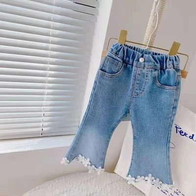 Moodsad tüdrukute laienevad püksid ühevärvilised teksad Beebi tüdrukud püksid Korea versioon lahtised vabaaja laste teksad