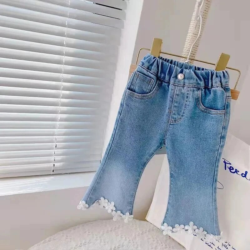 Moodsad tüdrukute laienevad püksid ühevärvilised teksad Beebi tüdrukud püksid Korea versioon lahtised vabaaja laste teksad