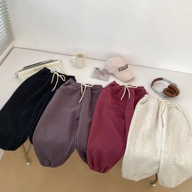 W2023 Winter Kids vientisos spalvos storina šiltas sportines kelnes berniukams ir mergaitėms Fleece pamušalas laisvos kelnės