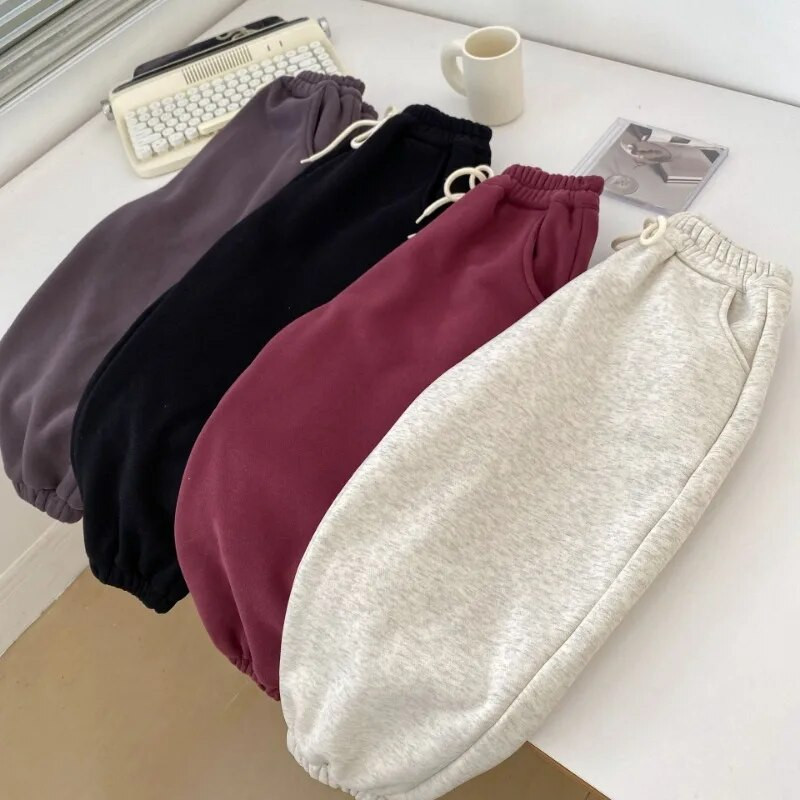 W2023 Winter Kids vientisos spalvos storina šiltas sportines kelnes berniukams ir mergaitėms Fleece pamušalas laisvos kelnės