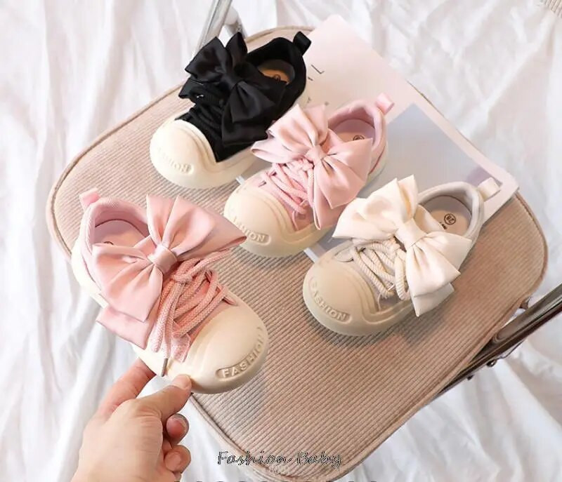 Rudens ziemas kedas bērniem, forši bērniem tīņiem, zēniem, meitenēm, modes, plakaniem apaviem, lieliem bantes rakstiem, kedām, 26-36, rozā