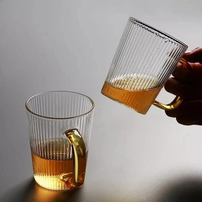 Briaunuotų sulčių vandens geriamojo stiklo puodelis su rankena Vertikalus dryžuotas borosilikatinis karščiui atsparus kavos puodelis Viskio taurelės stiklas