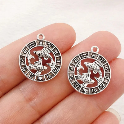 12 vnt sidabro spalvos 24x21 mm dvylikos žvaigždynų žavesio zodiako pakabukas, skirtas pasidaryk pats rankų darbo metalo astrologijos papuošalų kūrimo priedas