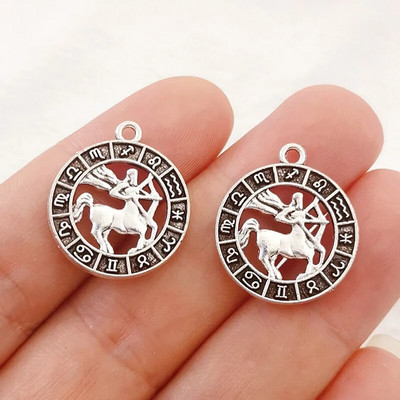 12 vnt sidabro spalvos 24x21 mm dvylikos žvaigždynų žavesio zodiako pakabukas, skirtas pasidaryk pats rankų darbo metalo astrologijos papuošalų kūrimo priedas