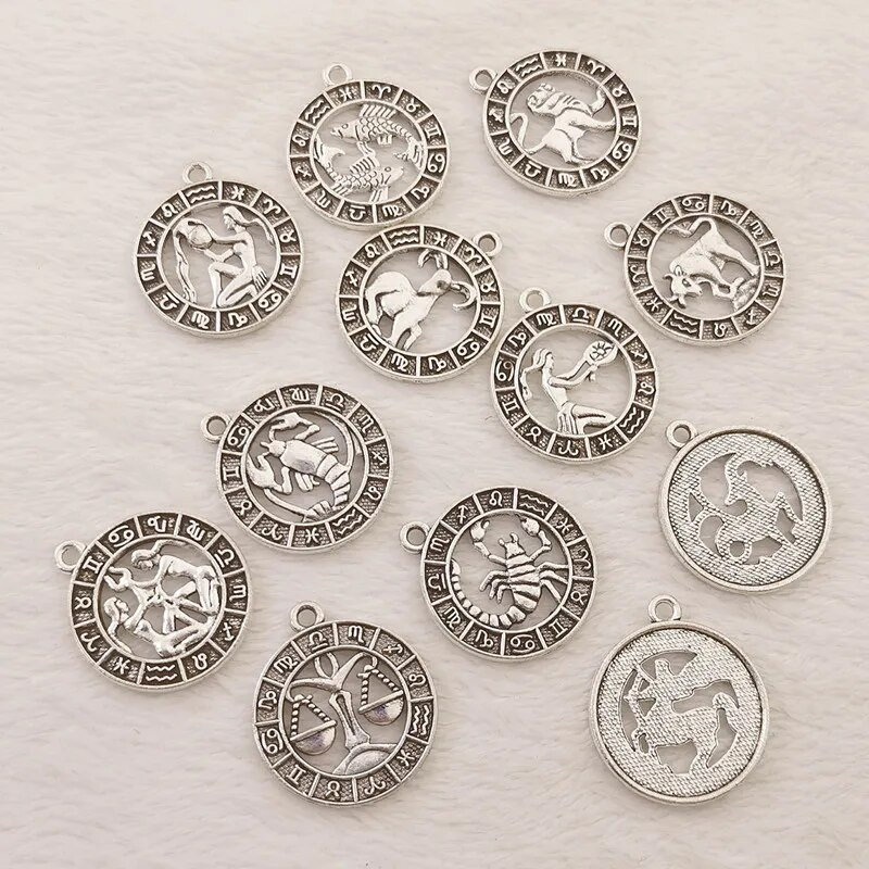 12 vnt sidabro spalvos 24x21 mm dvylikos žvaigždynų žavesio zodiako pakabukas, skirtas pasidaryk pats rankų darbo metalo astrologijos papuošalų kūrimo priedas