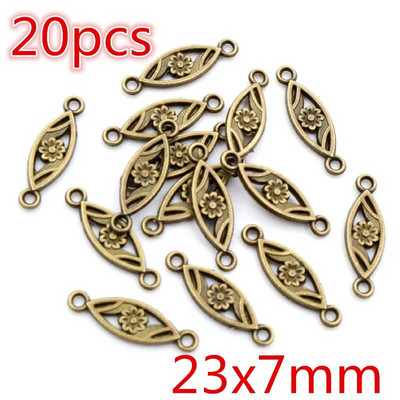 Νέα αντίκα επάργυρη επιμετάλλωση μπρούτζου με μεταλλικό σύνδεσμο Γούρια Κρεμαστό λουλούδι Vintage Μικρά γούρια DIY Κοσμήματα κολιέ Fidings