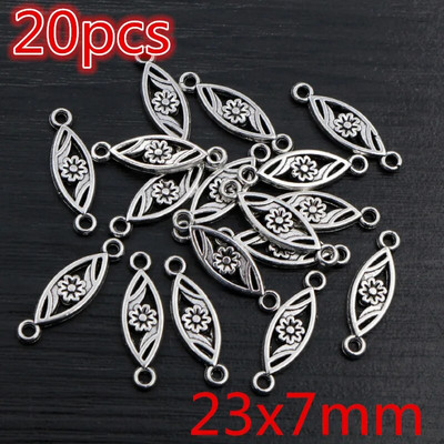 Νέα αντίκα επάργυρη επιμετάλλωση μπρούτζου με μεταλλικό σύνδεσμο Γούρια Κρεμαστό λουλούδι Vintage Μικρά γούρια DIY Κοσμήματα κολιέ Fidings