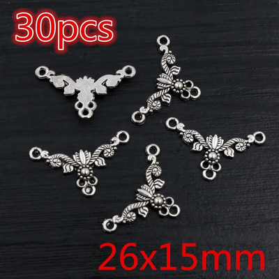 Νέα αντίκα επάργυρη επιμετάλλωση μπρούτζου με μεταλλικό σύνδεσμο Γούρια Κρεμαστό λουλούδι Vintage Μικρά γούρια DIY Κοσμήματα κολιέ Fidings