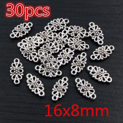 Νέα αντίκα επάργυρη επιμετάλλωση μπρούτζου με μεταλλικό σύνδεσμο Γούρια Κρεμαστό λουλούδι Vintage Μικρά γούρια DIY Κοσμήματα κολιέ Fidings