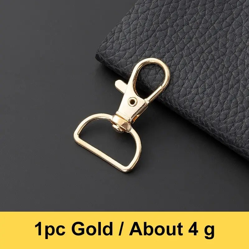 10 tk kullast pöörlevad klambrid + D-sõrmuse pandlad kott metallist rihmaga võtmehoidja klambriga konks metallist homaari küünised võtmehoidjate meisterdamiseks