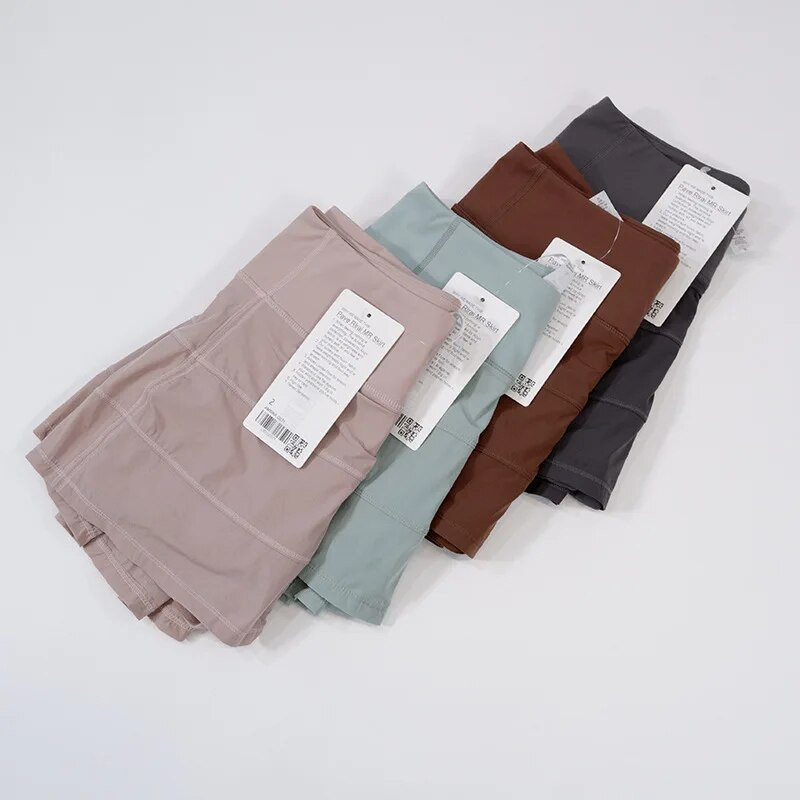 Luluwomen Pace Rival Тенис рокля с висока талия Йога пола Бързосъхнеща плисирана пола Спортна пола за бягане Дамска рокля с джобове