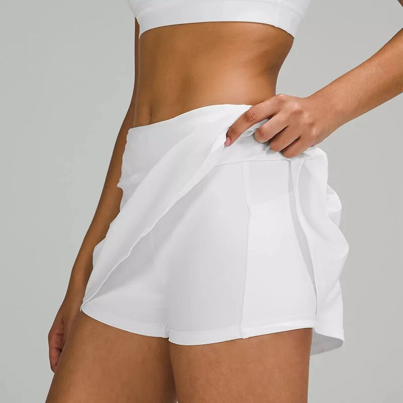 Luluwomen Pace Rival Тенис рокля с висока талия Йога пола Бързосъхнеща плисирана пола Спортна пола за бягане Дамска рокля с джобове