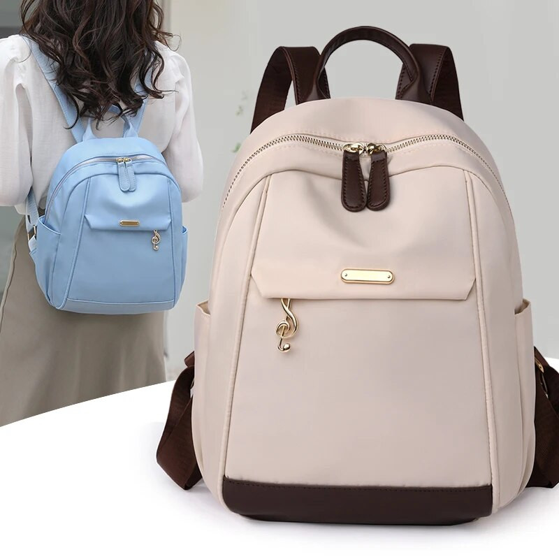 2023. gads. Jauna, liela ietilpība vienkārša stila brīvā laika sieviešu mugursoma neilona ūdensnecaurlaidīga auduma modes sieviešu plecu somas Ceļojumu somas