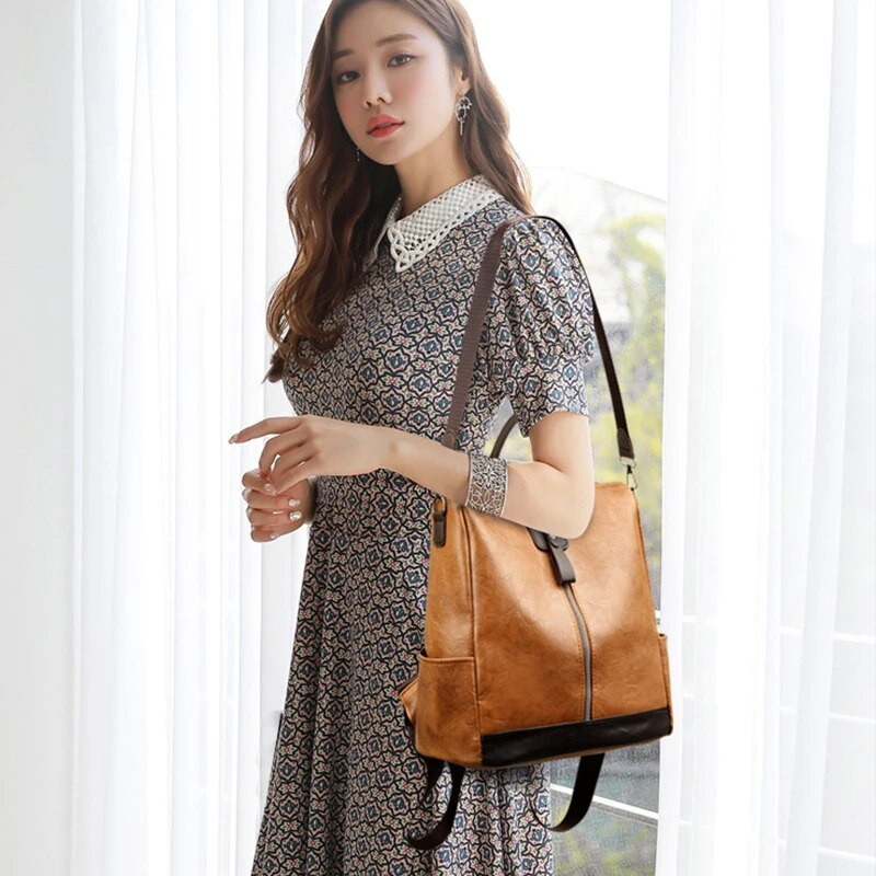 Modes pretaizdzīšanas sieviešu mugursomas Slavens zīmols augstas kvalitātes PU ādas ceļojumu mugursoma Sieviešu liela ietilpība plecu rokassomas