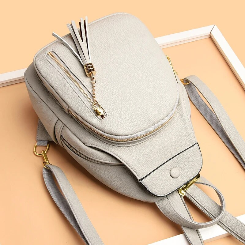 2023. gada ziema Jauns Pušķis Sieviešu ādas mugursomas Modes plecu somas Sieviešu mugursoma Sieviešu ceļojumu mugursoma Skolas soma meitenēm