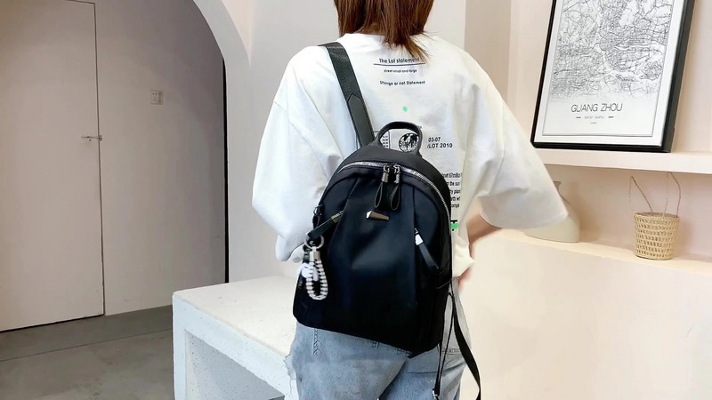 Modes mugursoma Ūdensnecaurlaidīga mugursoma sievietēm Kvalitatīvas skolas somas Sieviešu vienkrāsu ceļojumu Maza Soma Sieviešu daudzfunkciju soma