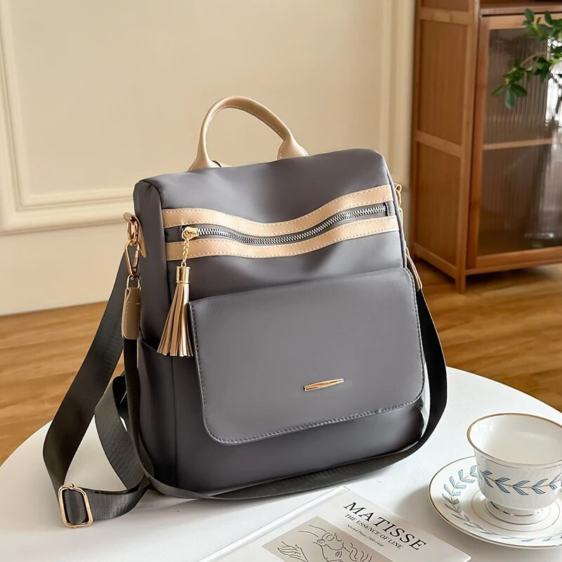 Sieviešu neilona mugursoma Lielas ietilpības pretaizdzīšanas mugursomas Daudzfunkcionāla atpūtas ceļojumu mugursoma jauniešu dizaina studentu somas